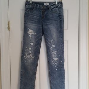 Distressed denim jeans